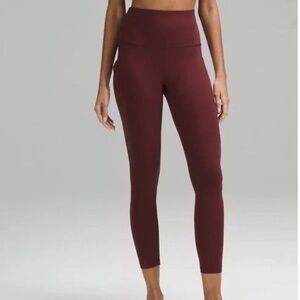 Lululemon running burgundy pocketed drawstring waist leggings size 4